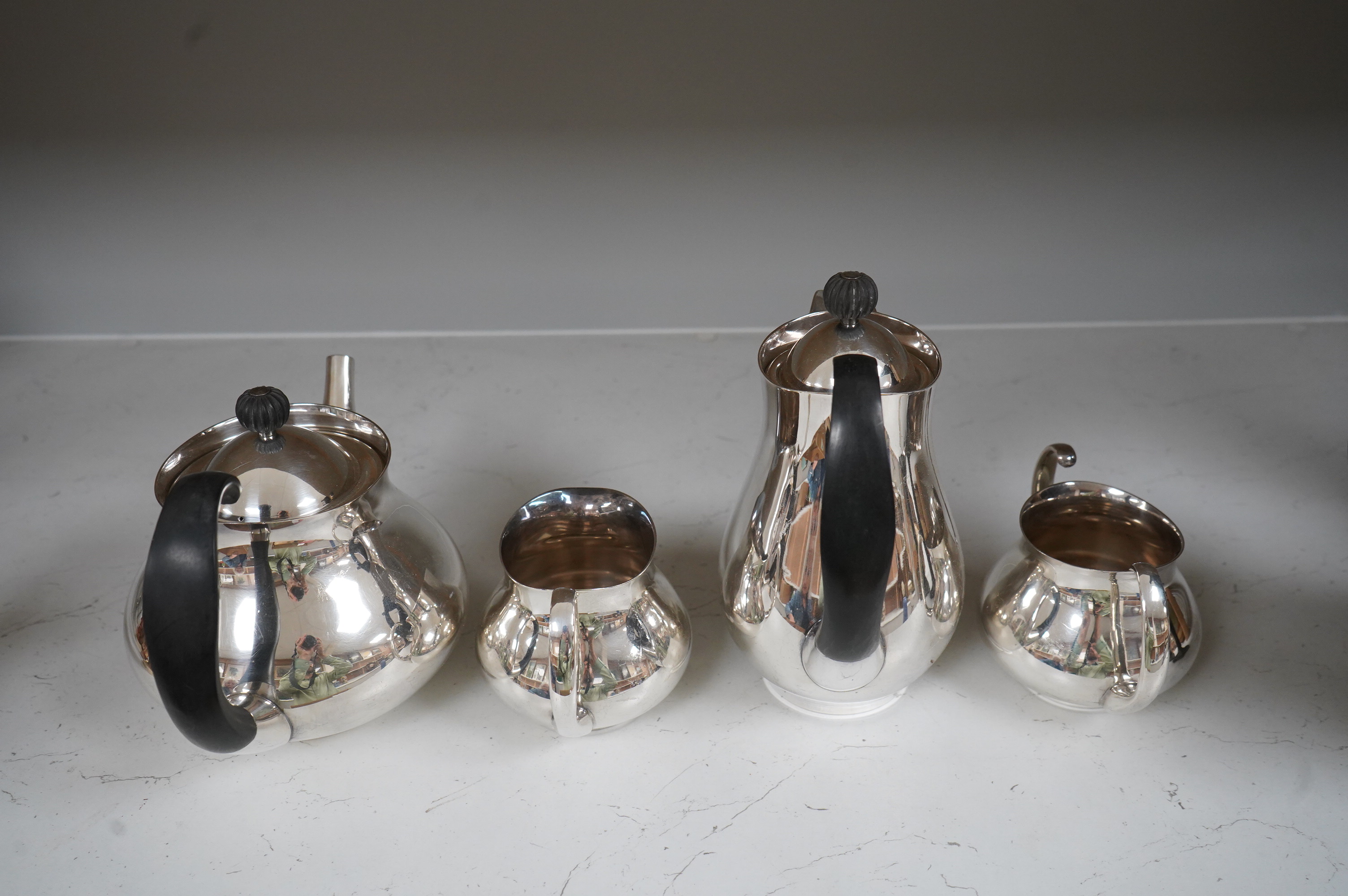 Eric Clements (1925-2019) a four piece plated tea set, c.1960, Embassy plate by M&W England, water jug and cover, 19.5cm high